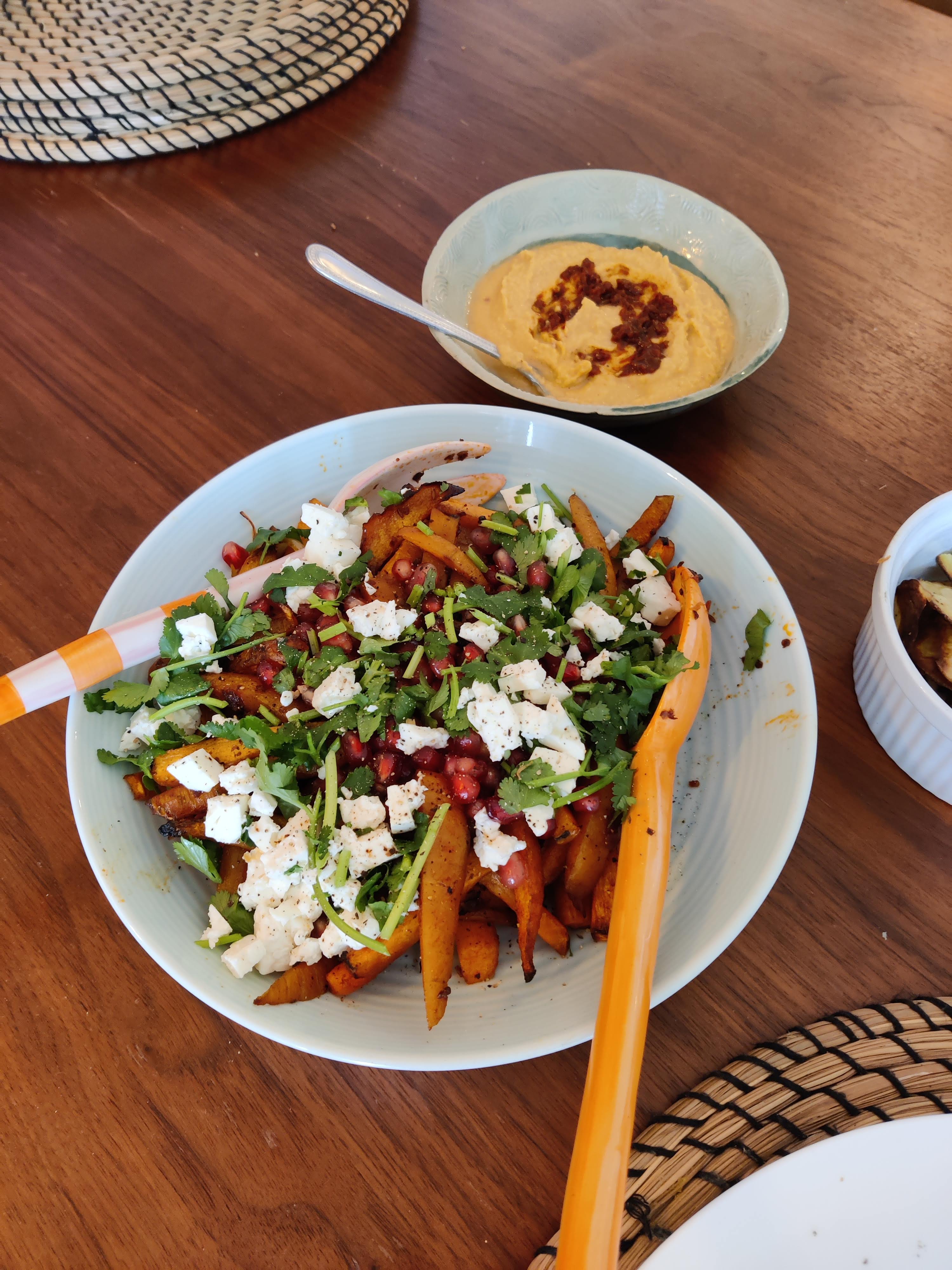 Roasted baby carrots with harissa and pomegranate