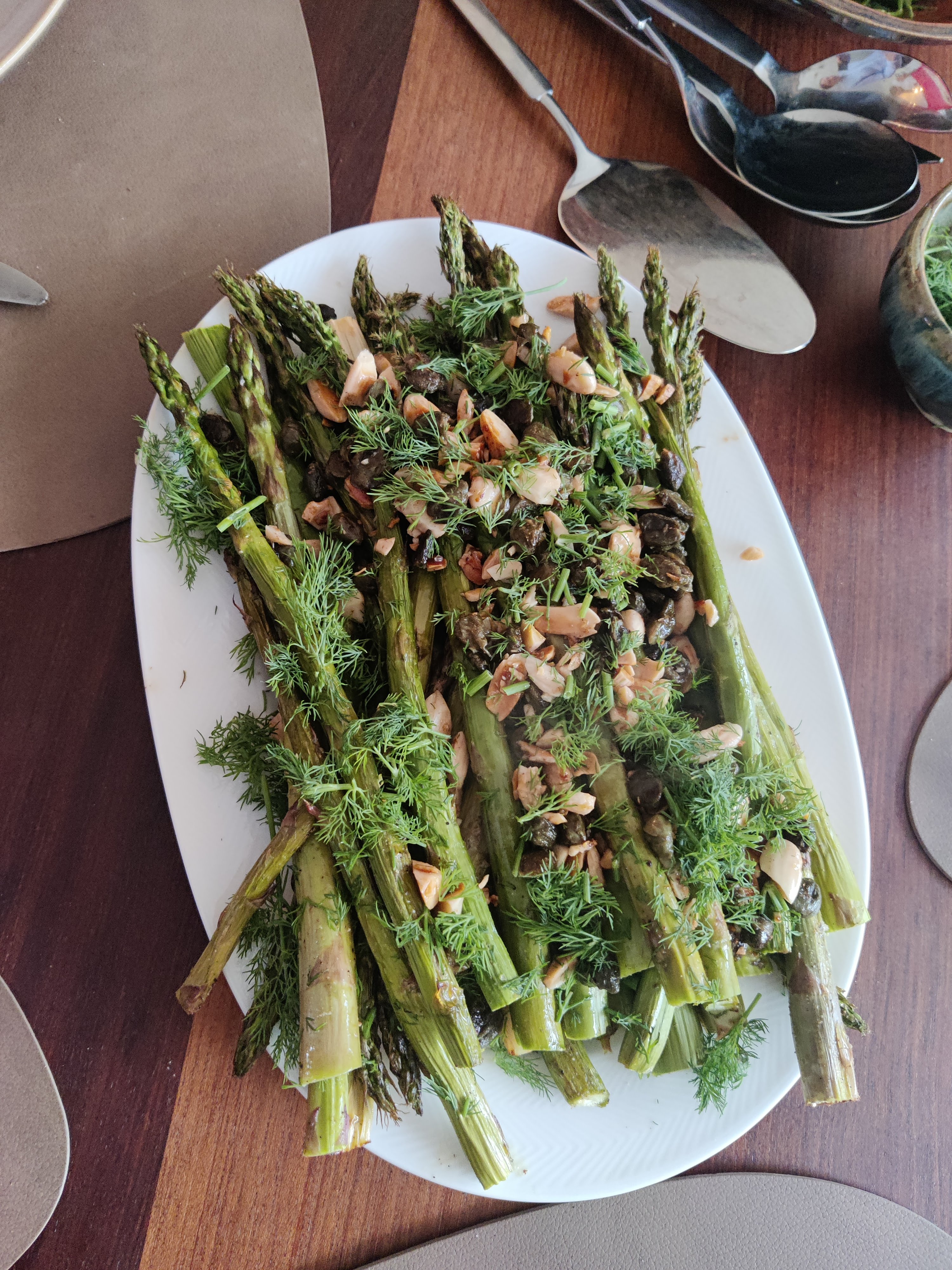 Roasted asparagus with buttered almonds, capers and dill
